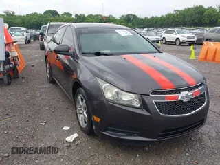 2014 Chevrolet Cruze 1LT z VIN 1G1PC5SBXE7336621, wystawiony jako IAAI lot #42290252 z przebiegiem 184 453 mil mil oraz . Historia ofert i sprzedaży dostępna na DreamBid. Obrazek 12.
