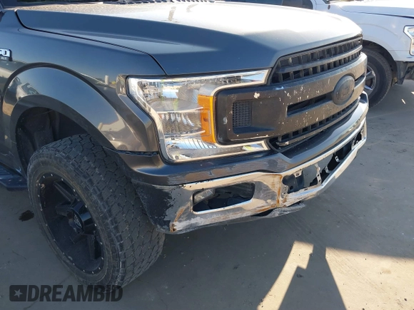 2019 Ford F-150 XL with VIN 1FTEW1CB3KKC43753, listed as a IAAI auction lot 41036512 with 108,257 mi miles and . Bid and sale history available at carsss.com. Image 6.