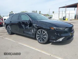 2025 Honda Accord Touring with VIN 1HGCY2F89SA027436, listed as a IAAI auction lot 41835197 with 390 mi miles and . Bid and sale history available at DreamBid. Image 13.