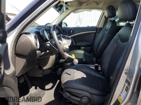 2012 MINI Countryman with VIN WMWZB3C58CWM02843, listed as a Copart auction lot 52131715 with Not Provided miles and Salvage Title. Bid and sale history available at DreamBid. Image 7.