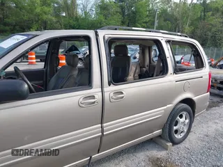 2001 Oldsmobile Silhouette GL z VIN 1GHDX03E31D261955, wystawiony jako IAAI lot #42161056 z przebiegiem 294 002 mil mil oraz . Historia ofert i sprzedaży dostępna na DreamBid. Obrazek 6.