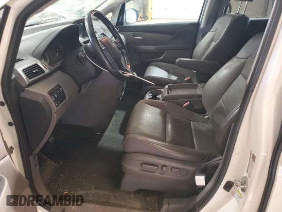 2016 Honda Odyssey Touring Elite with VIN 5FNRL5H91GB070424, listed as a Copart auction lot 55583075 with 115,709 mi miles and Salvage Title. Bid and sale history available at DreamBid. Image 7.