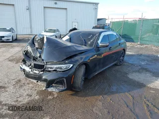 2020 BMW 3 Series M340i with VIN WBA5U7C05LAF54356, listed as a IAAI auction lot 41223565 with Not Provided miles. Bid and sale history available at carsss.com. Image 2.