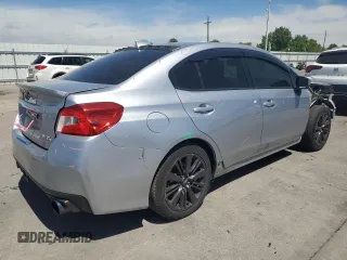2015 Subaru WRX Premium z VIN JF1VA1F60F9822800, wystawiony jako Copart lot #57797145 z przebiegiem 154 251 mil mil oraz Szkoda całkowita • Salvage title. Historia ofert i sprzedaży dostępna na DreamBid. Obrazek 3.