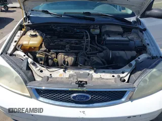 2007 Ford Focus S with VIN 1FAFP34N57W106082, listed as a IAAI auction lot 42594888 with 279,965 mi miles and . Bid and sale history available at DreamBid. Image 10.