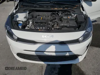 2023 Kia Rio S z VIN 3KPA24AD4PE561052, wystawiony jako Copart lot #55316785 z przebiegiem 94 184 mil mil oraz Nie do naprawy • Non repairable. Historia ofert i sprzedaży dostępna na DreamBid. Obrazek 11.