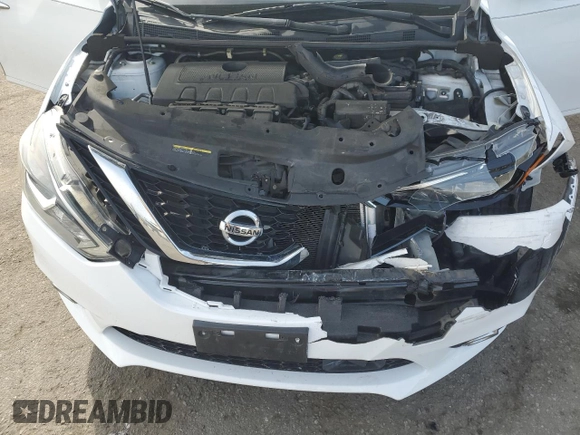 2018 Nissan Sentra S z VIN 3N1AB7AP7JY253930, wystawiony jako Copart lot #45311085 z przebiegiem 88 288 mil mil oraz Szkoda całkowita • Salvage title. Historia ofert i sprzedaży dostępna na DreamBid. Obrazek 12.