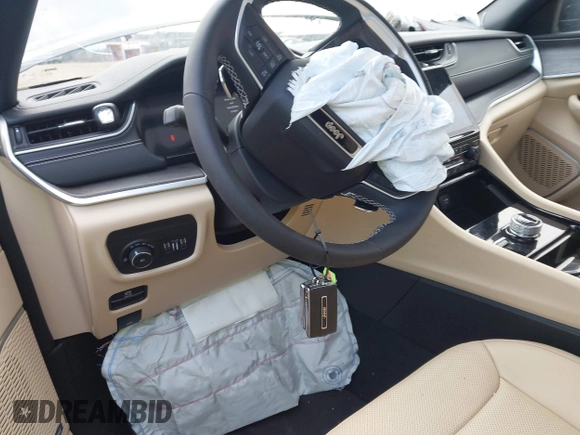 2023 Jeep Grand Cherokee Limited with VIN 1C4RJHBG1PC642541, listed as a IAAI auction lot 41959275 with 10,535 mi miles and . Bid and sale history available at DreamBid. Image 11.