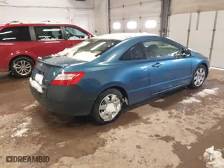 2007 Honda Civic Cpe LX with VIN 2HGFG12657H501602, listed as a IAAI auction lot 41715412 with 164,141 mi miles. Bid and sale history available at carsss.com. Image 4.