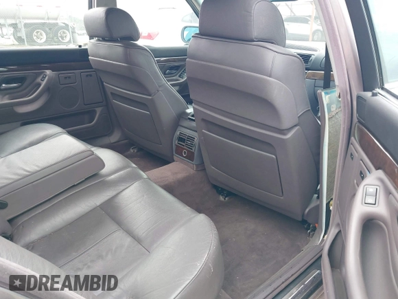 1998 BMW 7 Series 740il with VIN WBAGJ8323WDM23239, listed as a IAAI auction lot 41512630 with 221,673 mi miles. Bid and sale history available at carsss.com. Image 8.