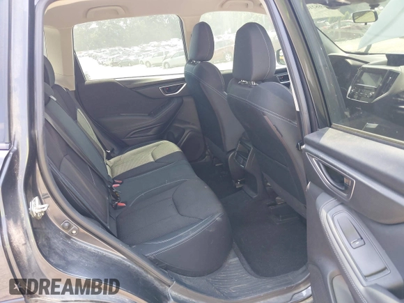 2019 Subaru Forester with VIN JF2SKACC6KH569407, listed as a IAAI auction lot 42682102 with 100,322 mi miles and . Bid and sale history available at DreamBid. Image 8.