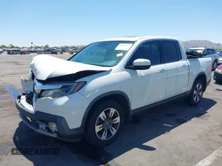 2019 Honda Ridgeline RTL-E with VIN 5FPYK3F74KB009279, listed as a IAAI auction lot 42348773 with 98,141 mi miles and . Bid and sale history available at DreamBid. Image 17.