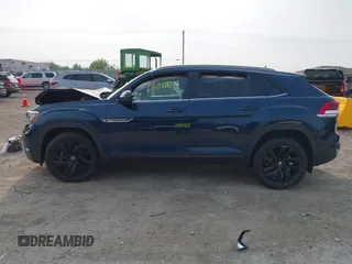 2022 Volkswagen Atlas SE z VIN 1V2KC2CA9NC216742, wystawiony jako IAAI lot #42406428 z przebiegiem 34 598 mil mil oraz . Historia ofert i sprzedaży dostępna na DreamBid. Obrazek 14.