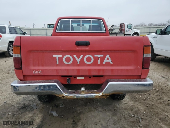 1991 Toyota 4WD Pickups DX with VIN JT4RN01P0M7042332, listed as a Copart auction lot 42408835 with 211481 miles and Salvage Title. Bid and sale history available at carsss.com. Image 6.