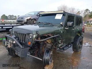 2009 Jeep Wrangler Rubicon with VIN 1J8GA64169L743008, listed as a IAAI auction lot 41792451 with NaN miles. Bid and sale history available at carsss.com. Image 2.