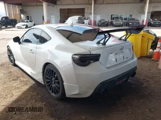 2014 Scion FR-S with VIN JF1ZNAA1XE8708258, listed as a IAAI auction lot 41809222 with 109,325 mi miles and . Bid and sale history available at DreamBid. Image 3.