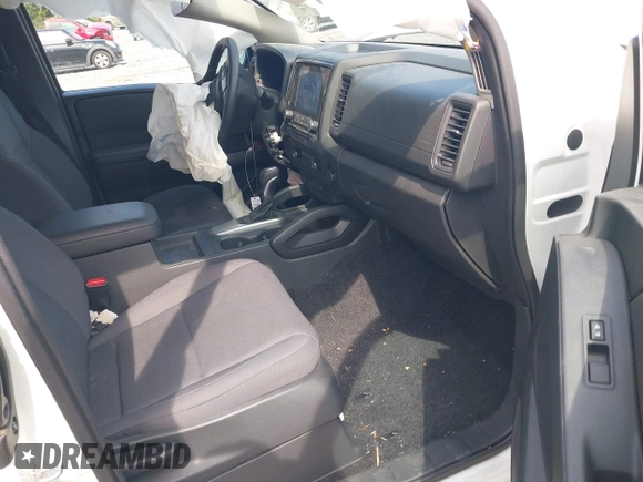 2023 Nissan Frontier S with VIN 1N6ED1CL1PN663285, listed as a IAAI auction lot 42704661 with 9,755 mi miles and . Bid and sale history available at DreamBid. Image 5.