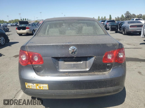 2005 Volkswagen Jetta 2.5L z VIN 3VWRG71K95M619046, wystawiony jako Copart lot #63351685 z przebiegiem 95 052 mil mil oraz Czysty tytuł • Clean title. Historia ofert i sprzedaży dostępna na DreamBid. Obrazek 6.