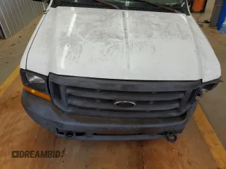 2000 Ford F-250 XL z VIN 1FTNF20L2YEC67228, wystawiony jako Copart lot #58785215 z przebiegiem 232 113 mil mil oraz Szkoda całkowita • Salvage title. Historia ofert i sprzedaży dostępna na DreamBid. Obrazek 11.