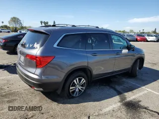 2016 Honda Pilot EX-L с VIN 5FNYF5H55GB003258, выставлен на аукционе Copart как лот 52395045 с пробегом 160 476 миль миль и Списание • Salvage title. История ставок и продаж доступна на DreamBid. Изображение 3.