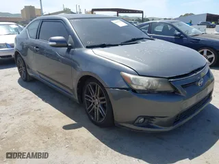 2011 Scion tC with VIN JTKJF5C72B3015652, listed as a IAAI auction lot 42087995 with 175,768 mi miles. Bid and sale history available at carsss.com. Image 1.