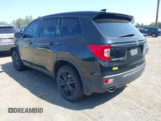 2021 Honda Passport Sport with VIN 5FNYF8H24MB004923, listed as a IAAI auction lot 42374410 with 144,314 mi miles and . Bid and sale history available at DreamBid. Image 3.