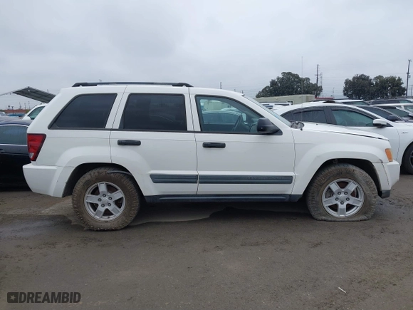 2006 Jeep Grand Cherokee Laredo with VIN 1J8GS48K16C348315, listed as a IAAI auction lot 41062772 with 239,662 mi miles. Bid and sale history available at carsss.com. Image 12.