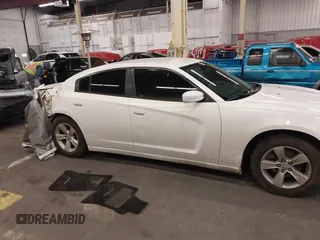 2013 Dodge Charger SE z VIN 2C3CDXBG9DH520241, wystawiony jako IAAI lot #41057114 z przebiegiem 148 768 mil mil oraz . Historia ofert i sprzedaży dostępna na DreamBid. Obrazek 14.