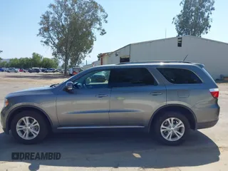 2012 Dodge Durango Crew with VIN 1C4RDHDG2CC317136, listed as a IAAI auction lot 41993837 with 131,048 mi miles and . Bid and sale history available at DreamBid. Image 14.