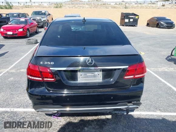 2014 Mercedes-Benz E 350 Sport with VIN WDDHF5KBXEA889555, listed as a IAAI auction lot 41589052 with 148,422 mi miles and . Bid and sale history available at DreamBid. Image 16.