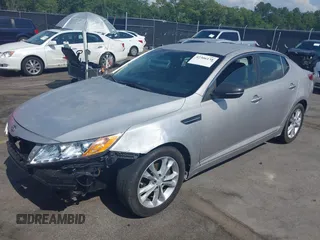 2013 Kia Optima EX with VIN 5XXGN4A75DG092276, listed as a IAAI auction lot 42306138 with 201,649 mi miles and . Bid and sale history available at DreamBid. Image 2.