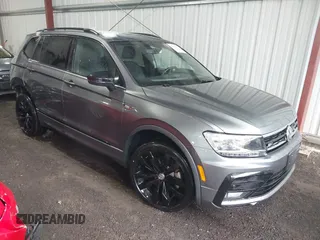 2021 Volkswagen Tiguan SE with VIN 3VV2B7AX0MM039117, listed as a IAAI auction lot 41991481 with 36,824 mi miles and . Bid and sale history available at DreamBid. Image 1.