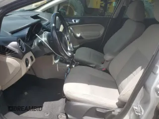 2014 Ford Fiesta SE z VIN 3FADP4BJ8EM133030, wystawiony jako Copart lot #52046065 z przebiegiem 113 792 mil mil oraz Szkoda całkowita • Salvage title. Historia ofert i sprzedaży dostępna na DreamBid. Obrazek 7.
