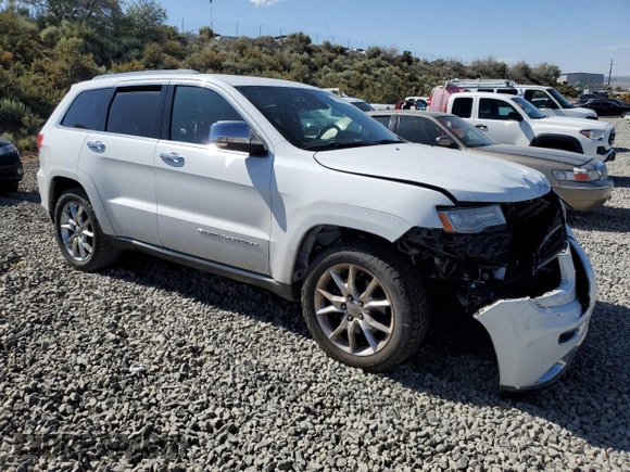 2014 Jeep Grand Cherokee Summit with VIN 1C4RJFJTXEC134150, listed as a Copart auction lot 61859265 with 159,262 mi miles and Salvage title. Bid and sale history available at DreamBid. Image 4.