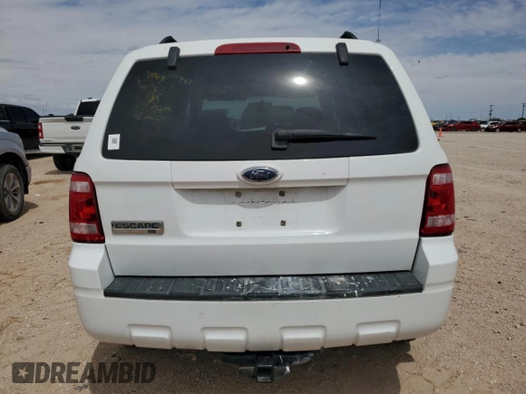 2008 Ford Escape XLT с VIN 1FMCU03158KC69094, выставлен на аукционе Copart как лот 56018345 с пробегом 218 497 миль миль и Списание • Salvage title. История ставок и продаж доступна на DreamBid. Изображение 6.