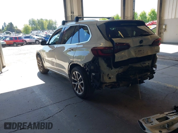 2022 BMW X5 xDrive40i with VIN 5UXCR6C09N9M21945, listed as a IAAI auction lot 42170363 with 23,537 mi miles and . Bid and sale history available at DreamBid. Image 3.