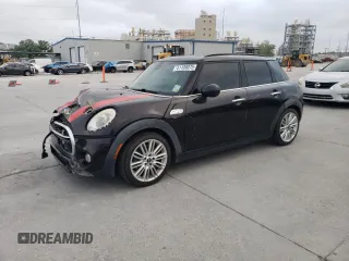 2015 MINI Hardtop 4 Door S z VIN WMWXU3C5XF2B56104, wystawiony jako Copart lot #51189075 z przebiegiem 113 586 mil mil oraz Szkody całkowita. Historia ofert i sprzedaży dostępna na DreamBid. Obrazek 1.