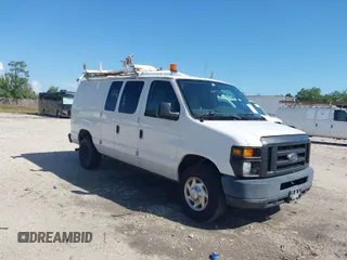 2012 Ford Econoline Cargo Commercial z VIN 1FTNE2EL4CDB10469, wystawiony jako IAAI lot #41861427 z przebiegiem 185 634 mil mil oraz . Historia ofert i sprzedaży dostępna na DreamBid. Obrazek 1.