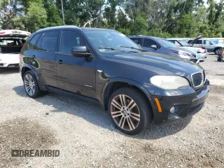 2012 BMW X5 35i with VIN 5UXZV4C54CL744502, listed as a Copart auction lot 57828115 with 161,597 mi miles and Clean title. Bid and sale history available at DreamBid. Image 4.
