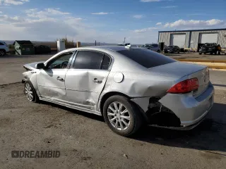 2011 Buick Lucerne CXL with VIN 1G4HC5EM7BU148074, listed as a Copart auction lot 50643555 with 127,734 mi miles and Salvage Title. Bid and sale history available at DreamBid. Image 2.