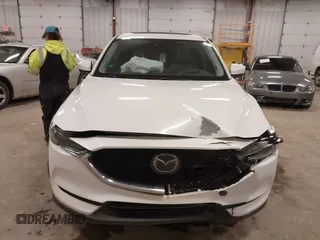 2018 Mazda CX-5 S Premium with VIN JM3KFBDM1J1412088, listed as a IAAI auction lot 41497431 with 65,532 mi miles and . Bid and sale history available at DreamBid. Image 12.