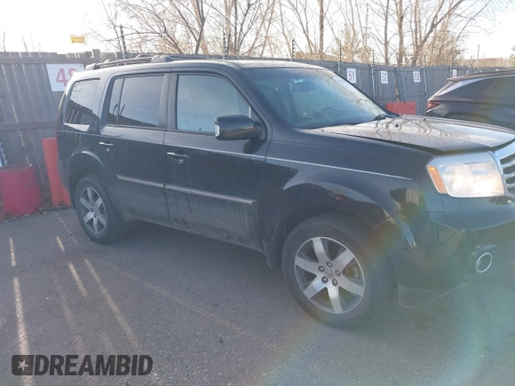 2012 Honda Pilot Touring with VIN 5FNYF4H93CB077057, listed as a IAAI auction lot 41156160 with 139,834 mi miles and . Bid and sale history available at DreamBid. Image 1.