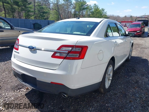 2015 Ford Taurus SE with VIN 1FAHP2D80FG176157, listed as a IAAI auction lot 41985771 with 102,252 mi miles and . Bid and sale history available at carsss.com. Image 4.