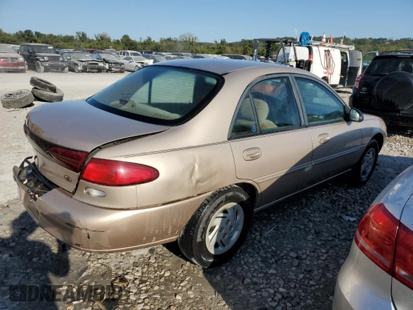 1997 Ford Escort LX with VIN 1FALP13P0VW403591, listed as a Copart auction lot 74321544 with 134,706 mi miles and Salvage Title. Bid and sale history available at DreamBid. Image 3.