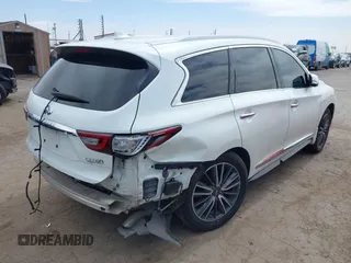 2019 Infiniti QX60 LUXE with VIN 5N1DL0MN5KC503552, listed as a IAAI auction lot 41780408 with 73,148 mi miles. Bid and sale history available at carsss.com. Image 4.