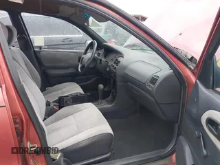 1997 Geo Prizm LSi with VIN 1Y1SK5265VZ457659, listed as a IAAI auction lot 41778510 with 149,073 mi miles. Bid and sale history available at carsss.com. Image 5.
