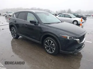 2023 Mazda CX-5 2.5 S Premium Package with VIN JM3KFBDM6P0235133, listed as a IAAI auction lot 41457826 with 7,860 mi miles. Bid and sale history available at carsss.com. Image 1.