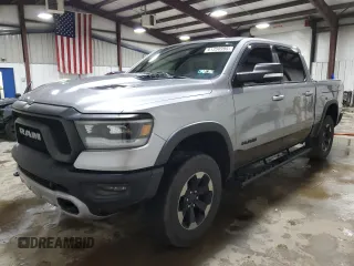 2019 Ram 1500 Rebel with VIN 1C6SRFLTXKN715405, listed as a Copart auction lot 61350995 with 65,360 mi miles and Salvage title. Bid and sale history available at DreamBid. Image 1.