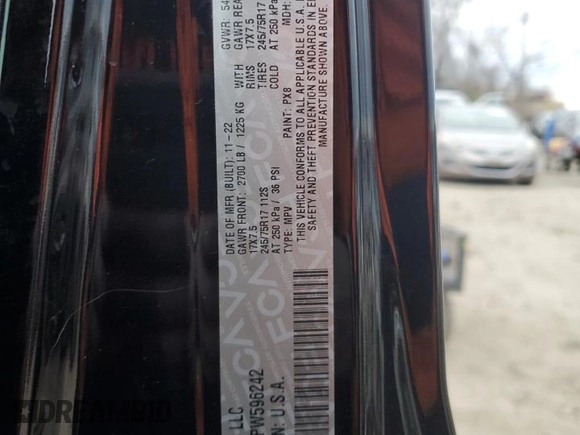 2023 Jeep Wrangler Sport S with VIN 1C4HJXDN1PW596242, listed as a Copart auction lot 82020314 with 30,061 mi miles and Salvage title. Bid and sale history available at DreamBid. Image 13.