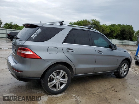 2012 Mercedes-Benz M 350 with VIN 4JGDA5HB2CA027986, listed as a Copart auction lot 71714874 with 165,916 mi miles and Salvage title. Bid and sale history available at DreamBid. Image 3.